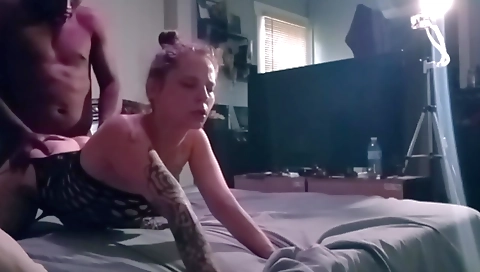 Blonde chick with natural tits is showing her tits