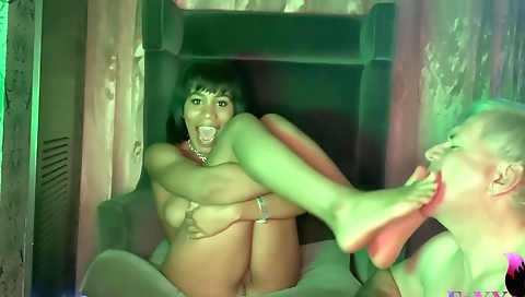 Busty ebony chick with nice ass gets cunnilingus and footfucking