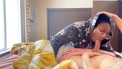 Mature black guy and brunette ebony girl talking on couch