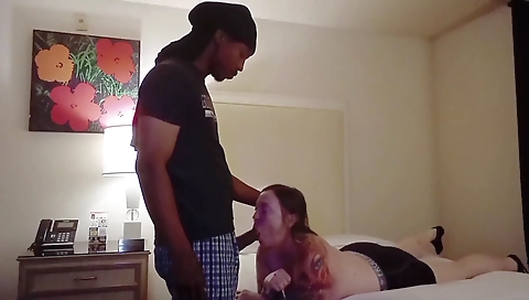 Amateur interracial blowjob with a tattooed young man
