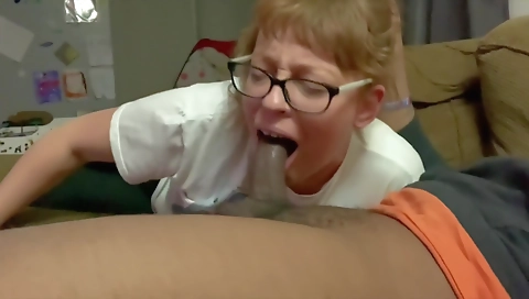 Red-haired brunette takes a cock in her mouth and deepthroat